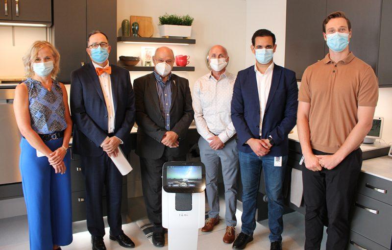 Jacquie Ripat and 5 others at opening of smart suite